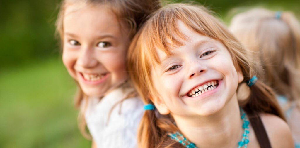 little girl smiles revealing Common dental problems in child