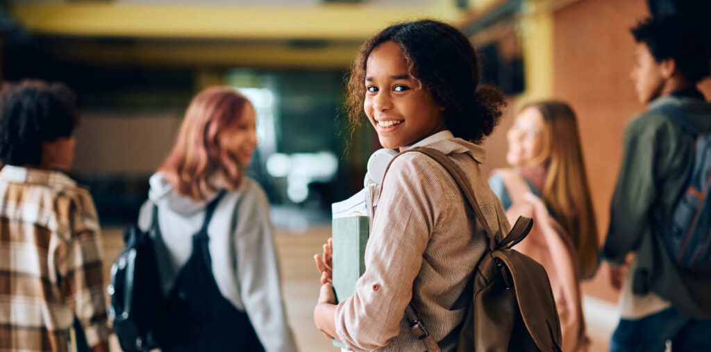 teen at school learns When to switch from pediatric dentist